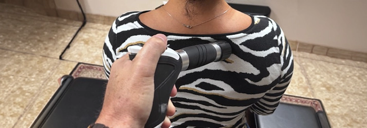 Shockwave Instrument Being Used On Patients Shoulder